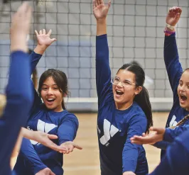 Kids playing volleyball at the YMCA